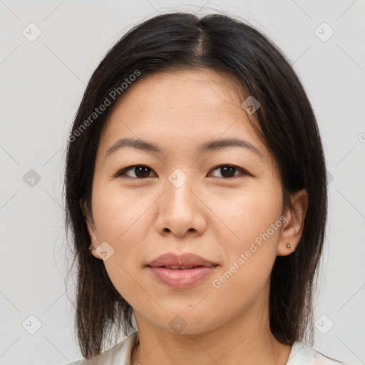 Joyful white young-adult female with medium  brown hair and brown eyes