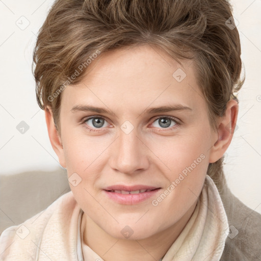 Joyful white young-adult female with medium  brown hair and blue eyes