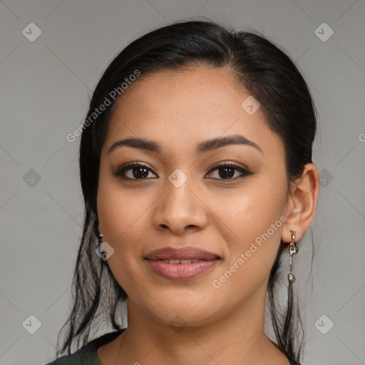 Joyful latino young-adult female with medium  brown hair and brown eyes