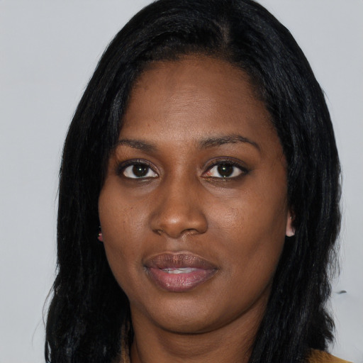 Joyful asian young-adult female with long  black hair and brown eyes