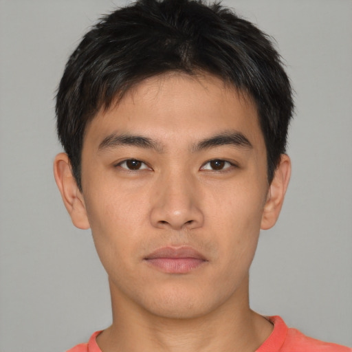 Neutral asian young-adult male with short  brown hair and brown eyes