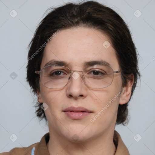 Joyful white adult female with medium  brown hair and brown eyes