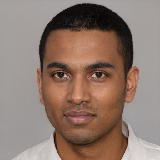 Neutral black young-adult male with short  black hair and brown eyes