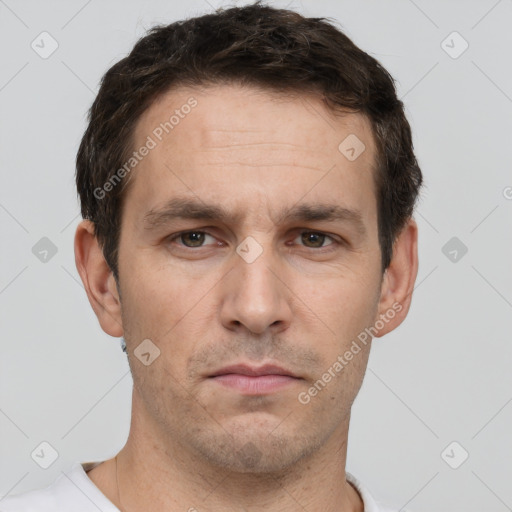 Neutral white young-adult male with short  brown hair and grey eyes