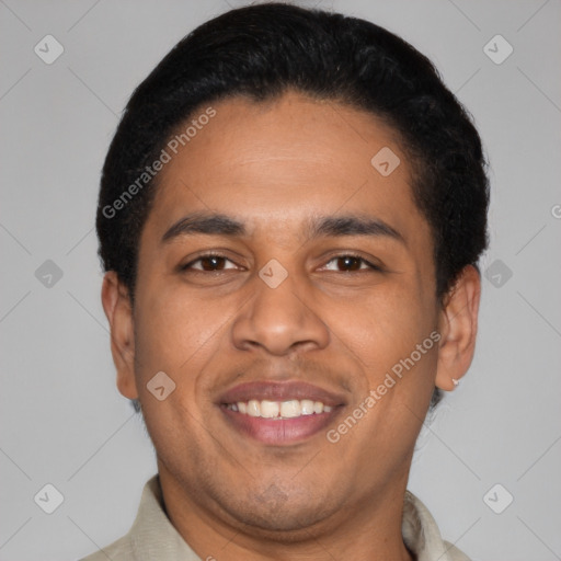 Joyful latino adult male with short  black hair and brown eyes