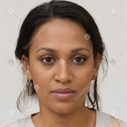 Joyful black young-adult female with medium  brown hair and brown eyes