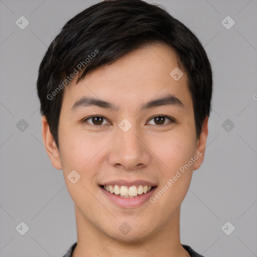 Joyful white young-adult male with short  black hair and brown eyes