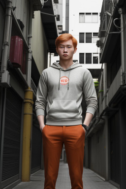 Singaporean adult male with  ginger hair