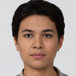 Neutral asian young-adult male with short  brown hair and brown eyes