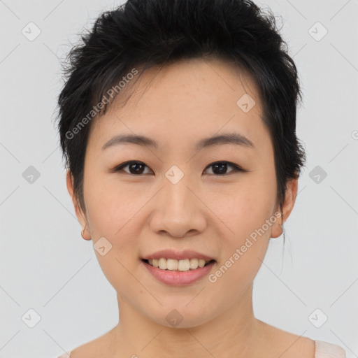 Joyful asian young-adult female with short  brown hair and brown eyes