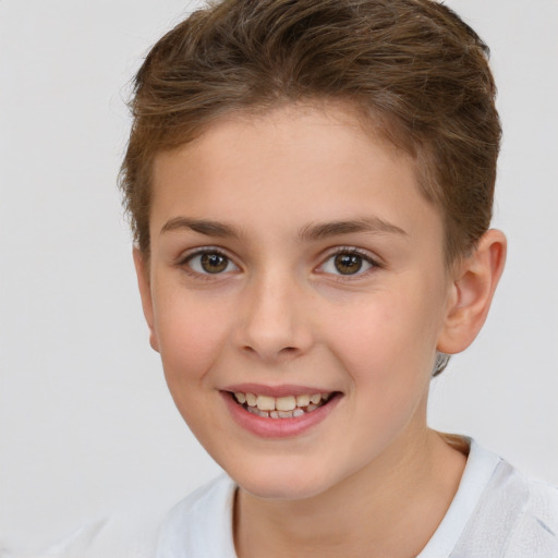 Joyful white child female with short  brown hair and brown eyes