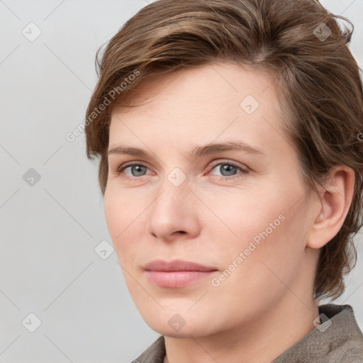 Neutral white young-adult female with medium  brown hair and grey eyes