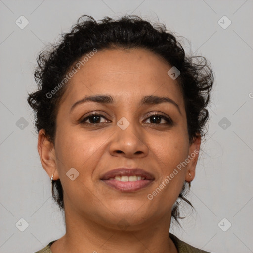 Joyful latino young-adult female with short  brown hair and brown eyes