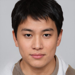 Neutral asian young-adult male with short  brown hair and brown eyes