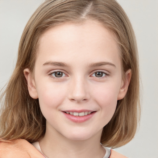 Joyful white child female with medium  brown hair and grey eyes