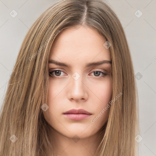 Neutral white young-adult female with long  brown hair and brown eyes