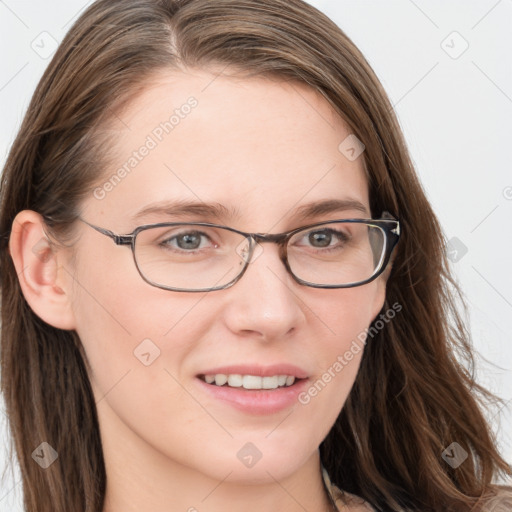 Joyful white young-adult female with long  brown hair and blue eyes