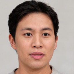 Neutral asian young-adult male with short  brown hair and brown eyes