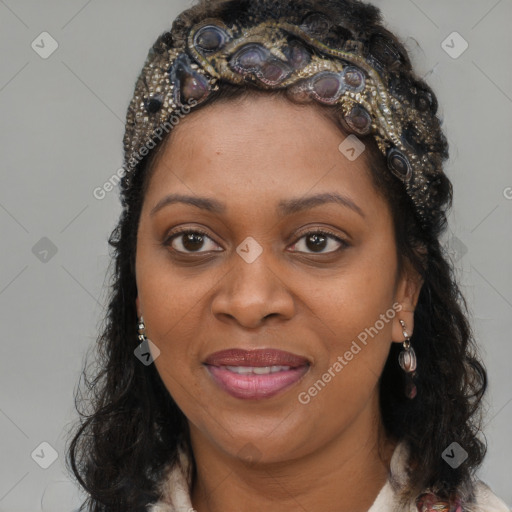 Joyful black young-adult female with long  brown hair and brown eyes