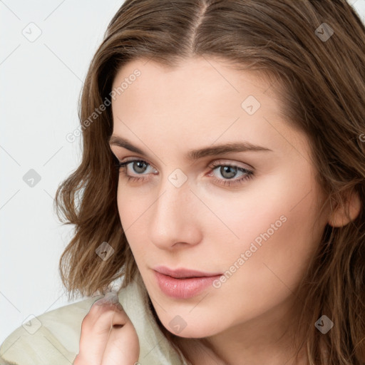 Neutral white young-adult female with long  brown hair and grey eyes