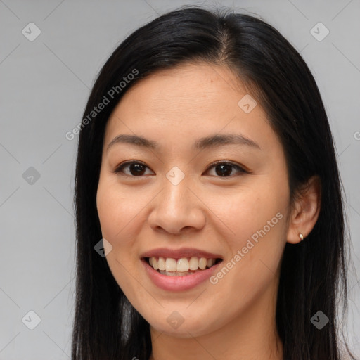 Joyful asian young-adult female with long  brown hair and brown eyes