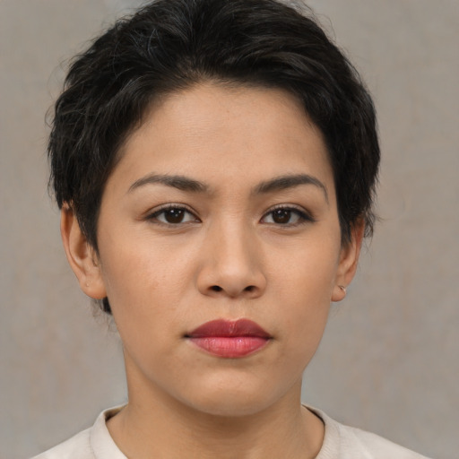 Neutral asian young-adult female with short  brown hair and brown eyes