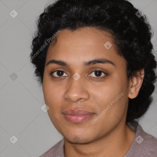 Joyful latino young-adult female with short  black hair and brown eyes