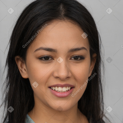 Joyful latino young-adult female with long  brown hair and brown eyes