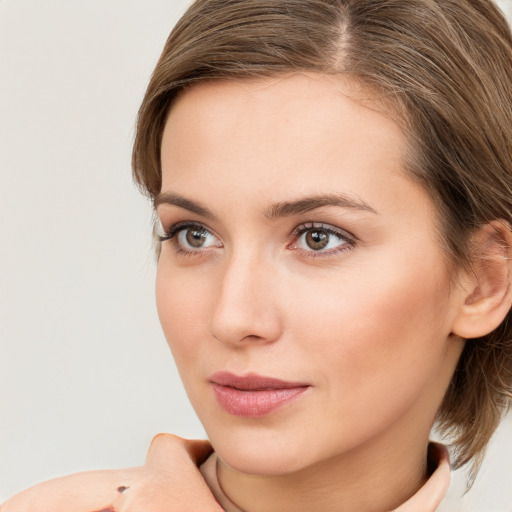 Neutral white young-adult female with medium  brown hair and brown eyes