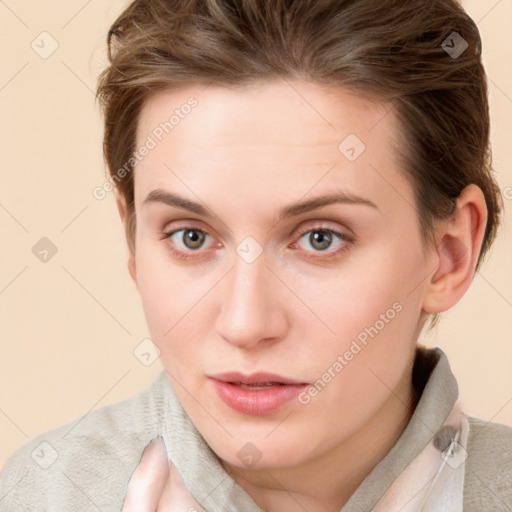 Neutral white young-adult female with short  brown hair and brown eyes