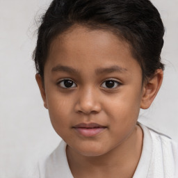 Joyful white child female with short  brown hair and brown eyes