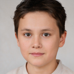 Joyful white child female with short  brown hair and brown eyes