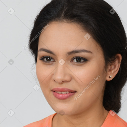 Joyful latino young-adult female with long  brown hair and brown eyes