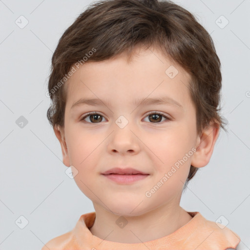 Joyful white child male with short  brown hair and brown eyes