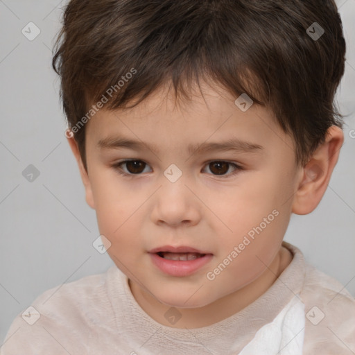 Joyful white child male with short  brown hair and brown eyes