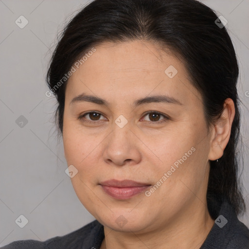 Joyful white adult female with medium  brown hair and brown eyes