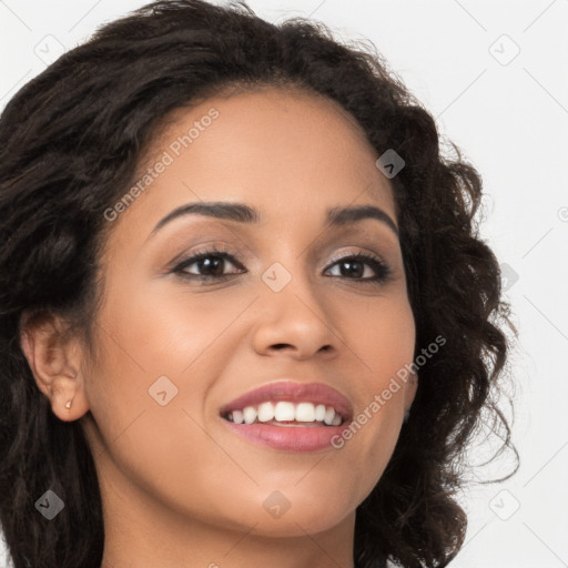 Joyful latino young-adult female with long  brown hair and brown eyes