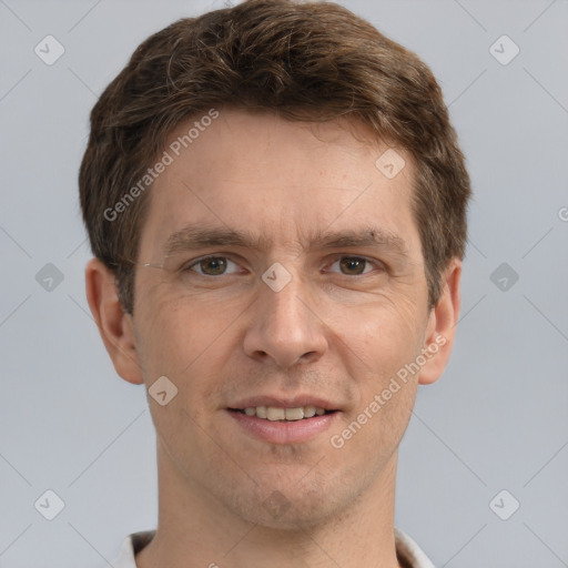 Joyful white adult male with short  brown hair and grey eyes