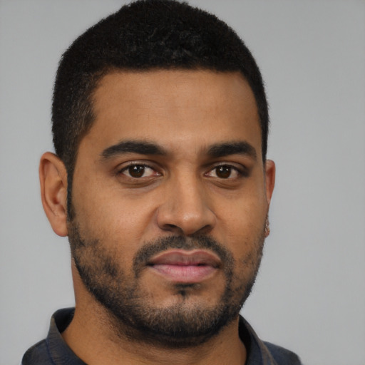 Neutral black young-adult male with short  black hair and brown eyes