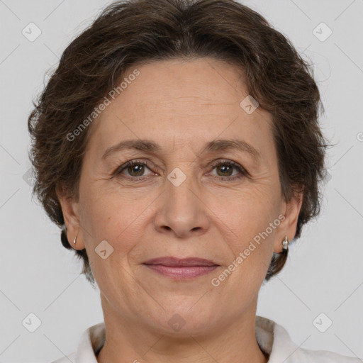 Joyful white adult female with short  brown hair and brown eyes