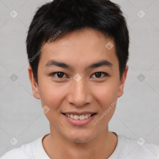 Joyful asian young-adult male with short  brown hair and brown eyes