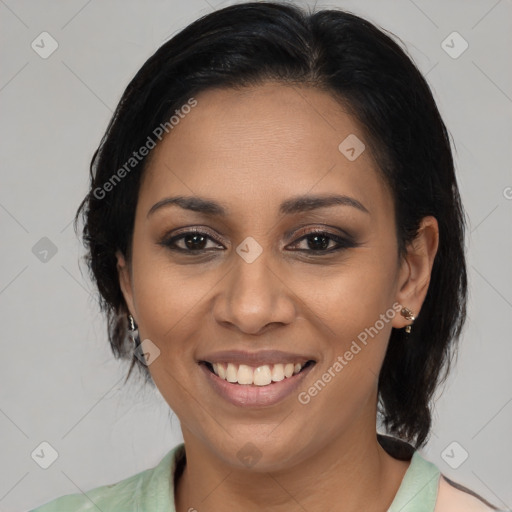 Joyful latino young-adult female with medium  brown hair and brown eyes