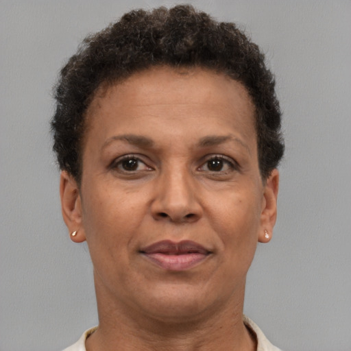 Neutral latino adult female with short  brown hair and brown eyes