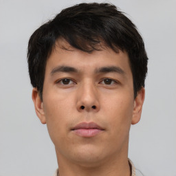 Neutral asian young-adult male with short  brown hair and brown eyes