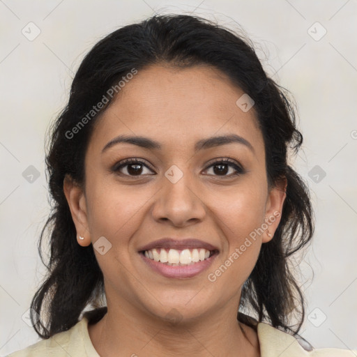 Joyful latino young-adult female with medium  brown hair and brown eyes