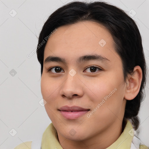 Joyful asian young-adult female with medium  brown hair and brown eyes