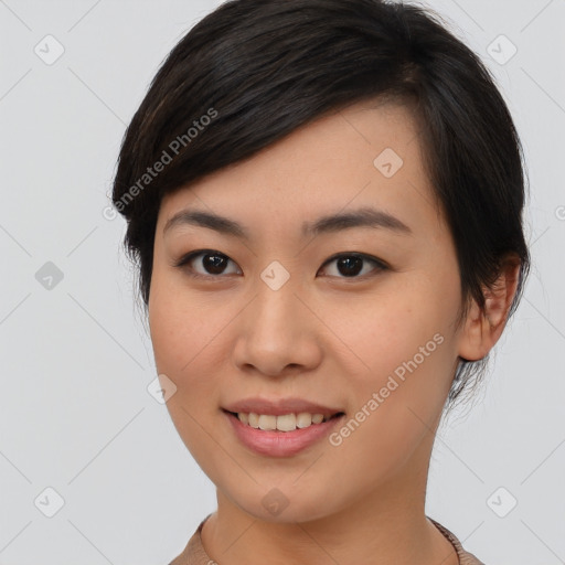 Joyful asian young-adult female with medium  brown hair and brown eyes