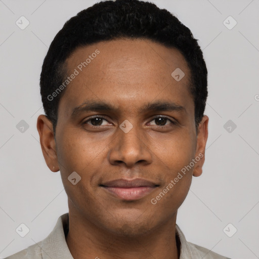 Joyful black young-adult male with short  black hair and brown eyes