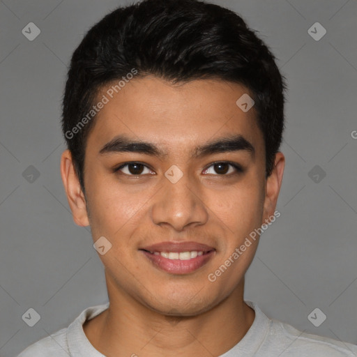 Joyful latino young-adult male with short  brown hair and brown eyes