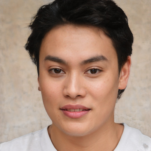 Joyful asian young-adult male with short  brown hair and brown eyes